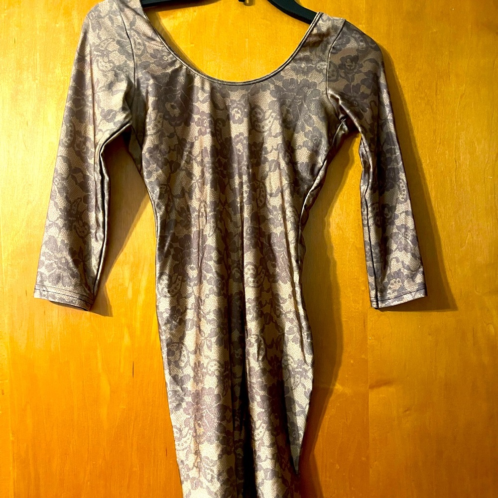 Ladies tan floral design spandex contour knee length dress.